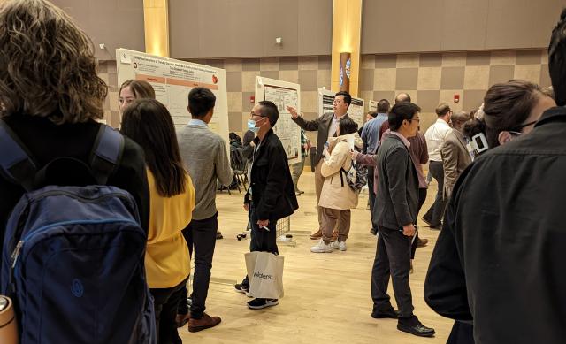 students attend poster session